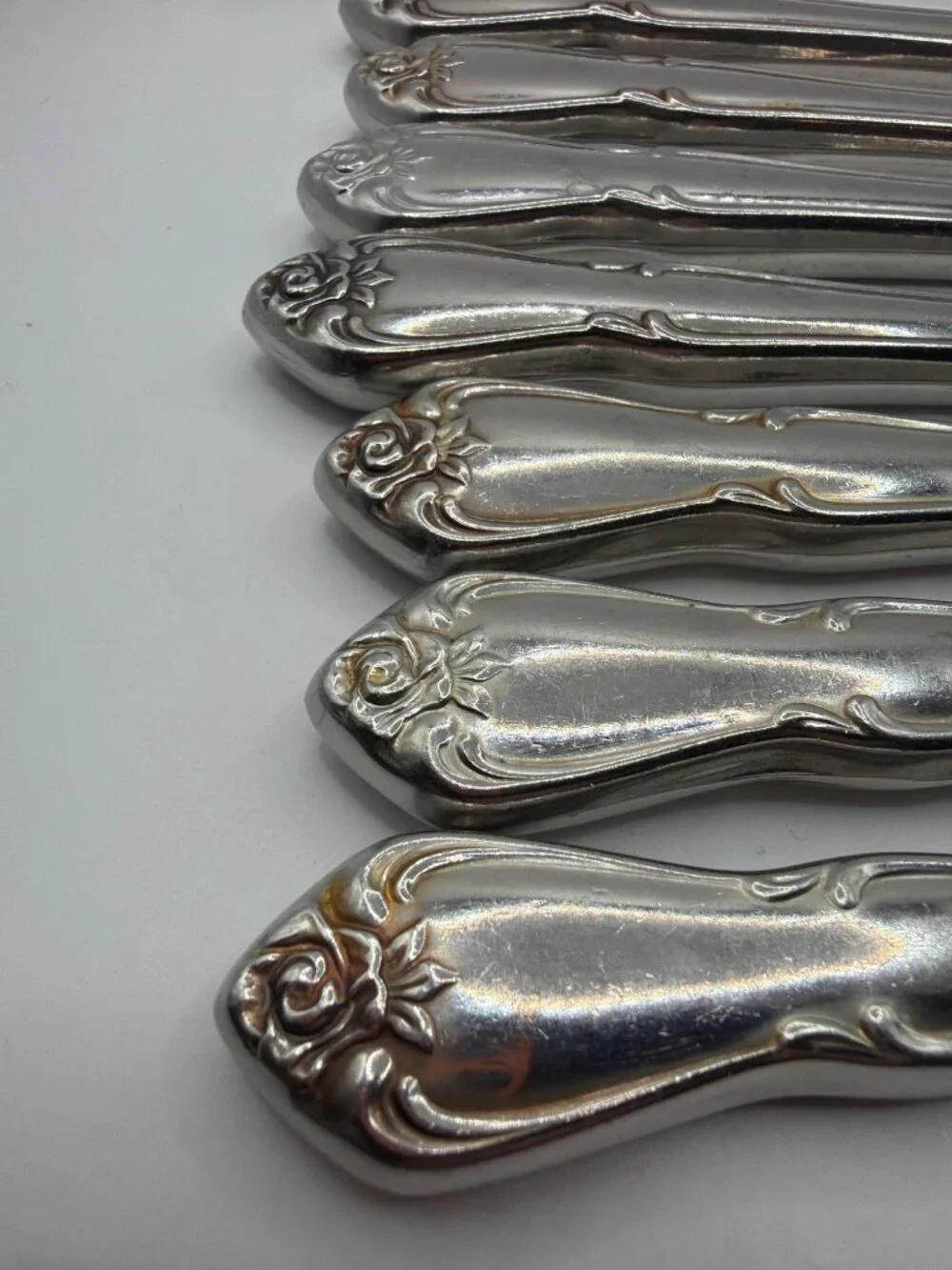 Set Of 8 Vintage Silver-Plated Dinner Knives With Ornate Rose Pattern Handles
